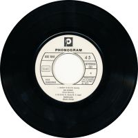 7" Promo sampler with one song written by Mickey